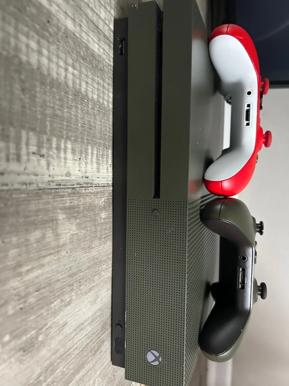 Xbox one s Console with Red and Olive Green Wireless Controllers